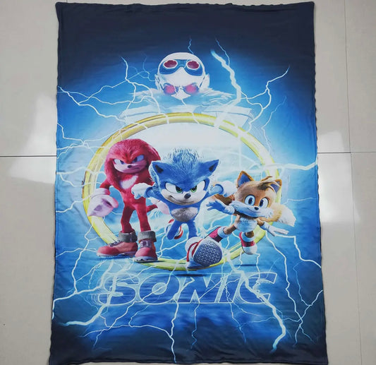 Cozy up with our new Sonic blanket! 🌀✨ Measuring at 30*43 inches, this soft and snuggly blanket is perfect for all Sonic fans out there. Whether you're watching your favorite Sonic movie or playing the latest game, this blanket will keep you warm and sty